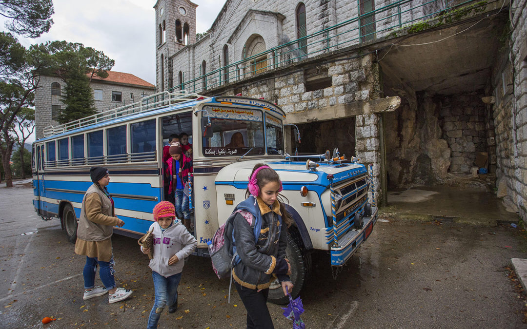 Bus driver brings Lebanese and Syrian children to school every day